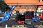 HSB 99 5901 NWE 11 beim Bekohlen nach einer Sonderfahrt Wernigerode - Nordhausen und zur�ck, dahinter rangiert 99 7232-4 mit einem Personenzug, fotografiert im Bw Wernigerode am Abend des 04.08.2012 