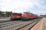 218 487-7 mit 432-2 und IC Allg�u f�hrt an 465 005-7 mit 865 611-8 in Amstatten vorbei.