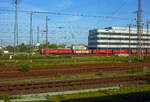 Aus einem IC heraus, die DB Ludmilla 232 587-6 (92 80 1232 587-6 D-DB) am 29 April 2025 bei Duisburg Hbf, mit einem offenen Hochbordwagen-Zug (vierachsiger offene Drehgestell-Güterwagen der