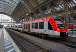 Zwei gekuppelte LINT 54 der VIAS Rail GmbH stehen am 21.03.2023 im Hauptbahnhof Frankfurt am Main, als RE 85 „Odenwaldbahn“ nach Babenhausen, zur Abfahrt bereit.