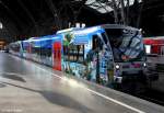 Durch Ausmusterung alter Fahrzeuge gibt es jedoch wieder Platz f�r Neues, wie dieser schmucke Triebzug zeigt:  650 543-1 Stadler Regio-Shuttle RS1, MRB VT 011 ( Mitteldeutsche Regiobahn ) mit Werbung