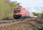 ÖBB 1116 194-0 mit EC Mozart und einer 1116 schiebend bei Ulm am 07.04.2011.