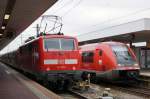 DB: Basel Badischer Bahnhof mit wartenden Zügen nach Offenburg (111 050-1) und Waldshut (641 027) am 29.