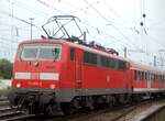 111 002-2 mit Nahverkehrzug in Ulm am 03.07.2009.
