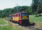 MThB: MThB Ae 477, ehemals DR BR 142 mit einem Güterzug bei Kehlhof im August 1995.
Foto: Walter Ruetsch