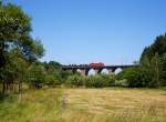   Die 152 167-3 (91 80 6152 167-3 D-DB) der DB Schenker Rail Deutschland fährt am 02.07.2015 mit einem Coil-Güterzug über den Rudersdorfer Viadukt in Richtung Dillenburg.