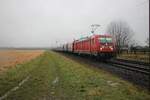 DBC 187 123 zieht ein Stahlzug durch Kaarst-Broicherseite am ganz verregneten 12.Februar 2026.