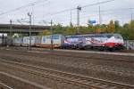 BR 189: Die POZNAN E 189-213 mit Werbeanstrich beim eher seltenen Passieren das Bahnhofs HAMBURG HARBURG am 13.