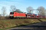 DBC 189 036 zieht ein FORD-PKW-Zug aus Dillingen (Saar) durch Boxtel ma 24 Februar 2021.