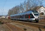 ET 23 001(3-teiliger Stadler Flirt) der Abellio Rail NRW f�hrt am 11.02.2012 kurz vor dem Bf Kreuztal.