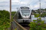   Der ET 23 2103  Werdohl  (94 80 0427 102-9 D-ABRN / 94 80 0827 102-5 D-ABRN / 94 80 0427 602-8 D-ABRN), ex ET 23 003, ein 3-teiliger Stadler Flirt der Abellio Rail NRW am 17.05.2015 auf der