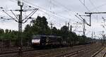 BRLL/DISPO 189 932-7 Class 189-VD IT-NC, REV/LD X/18.03.22 mit fast leerem Tragwagenzug. HH-Harburg 18.07.2026