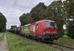 Das ist grün 193 301mit Kesselwagen im Nacken am Nixhof gen Dülken fahrend.