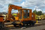   Schienenbagger SVP 60 (auch Schwellenwechselmaschine SVP 60) der Eisenbahnfreunde Wetterau e.V., Schweres Nebenfahrzeug 97 20 11 107 21-7, auf dem Vereinsgel�nde in Bad Nauheim am 20.08.2014.