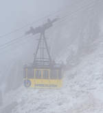 In den Wolken .......
Eine Gondel der Wendelstein-Seilbahn erreicht am 28.12.2016 bald im Nebel bei minus 6 Grad Celsius die Bergstation am Wendelstein auf 1.724 m über NN. Der Wendelstein selbst hat eine 1.838 m.

Während man hier oben bereits bei Frost in den Wolken war, so war es im Tal warm und klar. 

Bei der Bildbearbeitung habe ich sehr darauf geachtet, das Bild so herüberzubringen wie wir es sahen. Mit der Automatik des Programmes könnte man es auch klar aussehen lassen.