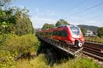   Zwei gekoppelte 4-teilige Bombardier Talent 2 (BR 442 / 443) der DB Regio NRW fahren am 23.08.2015, als RE 9 (rsx - Rhein-Sieg-Express) Siegen - Köln - Aachen, bei Siegen-Eiserfeld über
