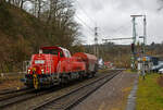 Die Kreuztaler 265 031-5 (92 80 1265 031-5 D-DB), eine Voith Gravita 15L BB der DB Cargo AG, fährt am 18.02.2023 mit einem einzelnen Coil-Güterwagen der Gattung Shimmns durch Scheuerfeld