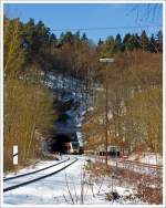   Ein Stadler GTW 2/6 der HellertalBahn als RB 96 Betzdorf-Herdorf-Neunkirchen, verl��t gerade den 131 m langen Alsdorfer Tunnel, hier am 13.03.2013.