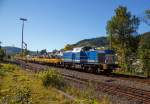   Die V 100-SP-006 (NL-SLG 92 84 2203 006-6) der SLG Spitzke Logistik GmbH, ex DR 110 340-7, ex DR 112 340-5, ex DB 202 340-6, f�hrt am 02.10.2015, mit einem Flachwagenzug der Gattung Res 072-2, durch