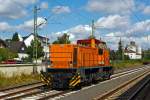   Die Lok 831 (98 80 0272 007-2 D-HEB), eine MaK DE 1002, der HLB - Hessische Landesbahn GmbH hat am 20.08.2014 im Bahnhof Butzbach Pause.