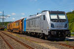   Die RAILPOOL 187 311-6 (91 80 6187 311-6 D-Rpool), eine Bombardier TRAXX F140 AC3 LM, ist mit dem Vossloh Hochgeschwindigkeitsschleifzug HSG - 2 (Vossloh High Speed Grinding), Schweres Nebenfahrzeug