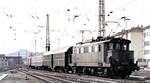 144 076-7 mit Nahverkehrszug in Pforzheim am 17.04.1982.