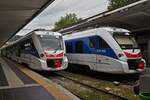 In Trieste stehen diese beiden Triebzüge ETR 563 & 564, zur abfahrt bereit am Bahnsteig.