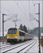 - Winter in Luxemburg - Auf der kurvenreichen Nordstrecke gibt es nur wenige Stellen, an denen es m�glich ist, das Aufwirbeln des Schnees durch die Z�ge auf den Chip zu bannen.