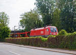   Der �BB Taurus II (Siemens ES64U2) 1116 123-1 (91 81 1116 123-1 A-�BB) f�hrt am 17.06.2018 mit einem leeren Autozug durch Freising in Richtung M�nchen.