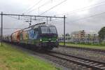 Flying Dutchman LTE 193 232 zieht am grauen 17 Mai 2021 ein Getreidezug durch Wijchen und wird vom hinter das Heckwerck erwischt.