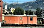 RhB Magazinwagen Xk 9078 in Samedan im August 1990.