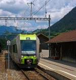 Bei Boltigen kommt unserem Zug am 28.05.2012 dieser  L�tschberger  - BLS RABe 535 107 entgegen.