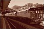 Die SMB Be 4/4 171 mit einem Extrazug von Basel nach Sion beim Halt in Lausanne am 27.