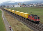 Postzug mit der Re 420 318-8 zwischen Bettlach und Selzach am sehr tr�ben 22.