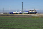 Re 421 387-2 Rheingold, ehemals SBB Cargo, mit Testzug.