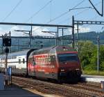Re 460 094-6  Raetia  (mit Werbung f�r Carsharing Schweiz) mit DoSto IC kommt von Lausanne und f�hrt am 28.05.2012 in den Bahnhof Pal�zieux ein.