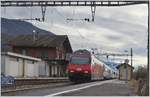 Eine SBB Re 460 mit dem IR 1716 bei der Durchfahrt in Roches VD am 6.