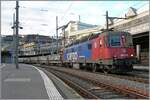 Die SBB Re 6/6 11619 (Re 620 019-0)  Arborn  wartet mit gut 20 Fans-u in auf die Weiterfahrt.