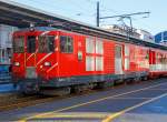   Der MGB Deh 4/4 II - 93 „Oberwald“ am 30.12.2015 mit einem Regionalzug in Brig.