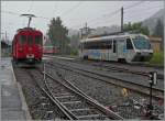 RhB ABe 4/4 N° 35 und CEV Beh 2/4 72 in Blonay.