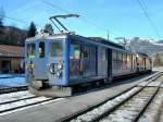 Der MOB BDe 4/4 3006 und eine weiterer im noch nicht umgebauten Bahnhof von Gstaad.