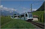 Drei Generationen ASD Triebzüge: Oberhalb von Aigle ist der neue ABe 4/8 473  Glacier 3000  auf dem Weg nach Les Diablerets.