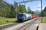 RhB Ge 4/4 III Nr.647 mit Werbung für Swiss Canterbank in Spinas am 19.08.2009.