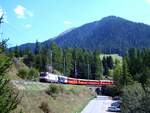 RhB Ge 4/4 Nr.641 III mit Werbung für Coop in Bergün am 08.09.2005.