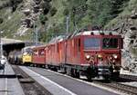 RhB Gem 4/4 Nr.801 und ABe 4/4 II Nr.41 mit Personenzug mit G�terbef�rderung und offenem Aussichtswagen im Zugverband in Alp Gr�m im August 1990.