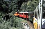 RhB Jubiläumsfahrt mit Ge 2/2 Nr.161  Eselein  und ABe 4/4 Nr.37 auf dem Kehrviadukt bei Brusio im August 1989.