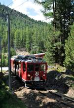 RhB ABe 4/4 Nr.49 auf de Benina-Bahn bei Pontresina am 24.08.2009.