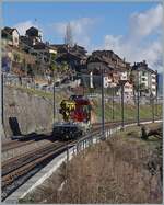 Der Tm 234.422-4  Dart  (Windhoff) ist bei St-Saphorin auf dem Weg in Richtung Lausanne.