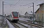 Der SBB RABe 522 203 verlässt Grandvillars als RE nach Biel/Bienne. 

11. Jan.2019