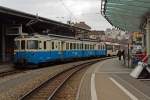   Doppeltriebwagen ABDe 8/8 Nummer 4002 (Vaud) der Montreux–Berner Oberland-Bahn (MOB), französisch Chemin de fer Montreux-Oberland bernois, am 26.02.2012 im Bahnhof Montreux.